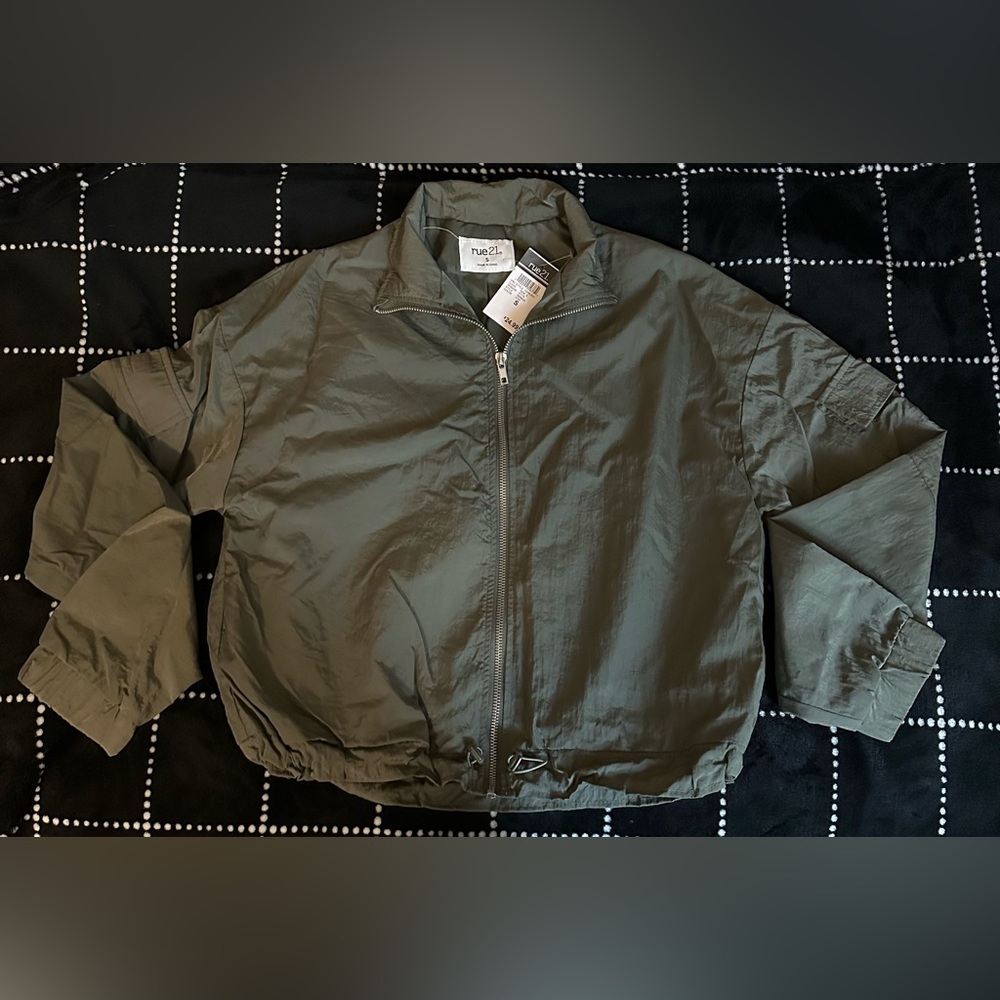 green jacket. Small